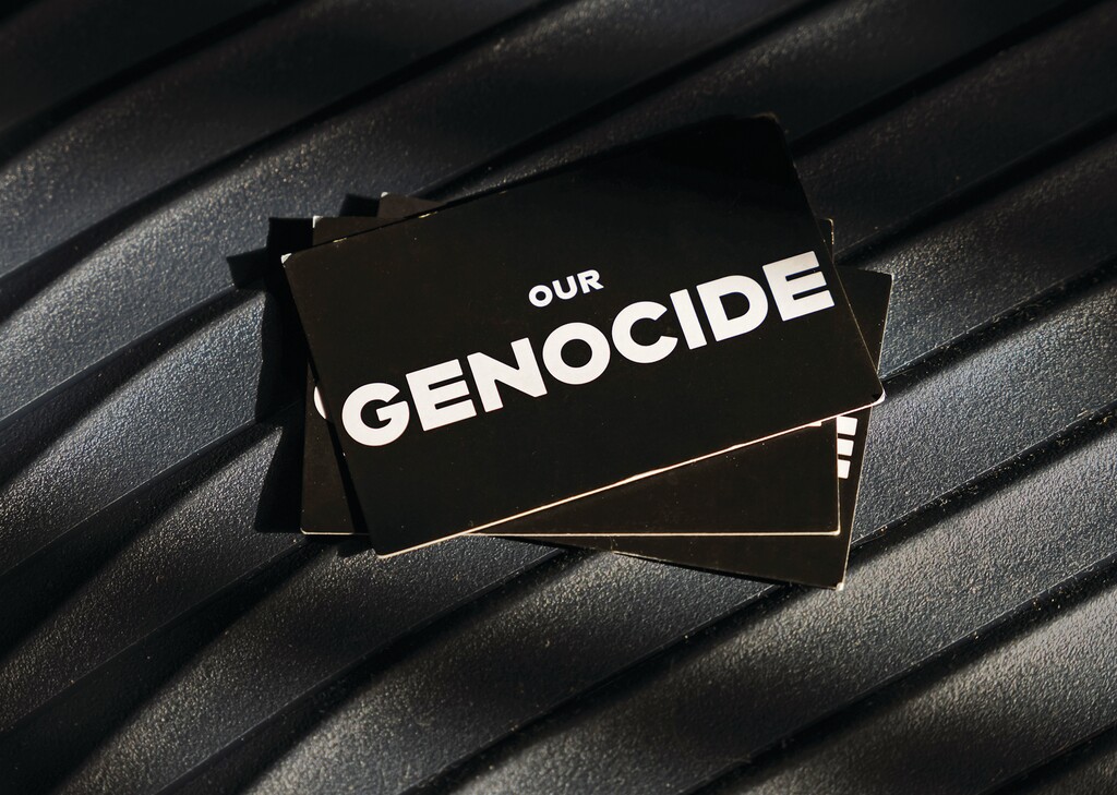 (Ofir Berman | The New York Times) Business cards of B’Tselem — an Israeli human rights organization whose report about Gaza was titled “Our Genocide,” in Tel Aviv on Nov. 20, 2025.