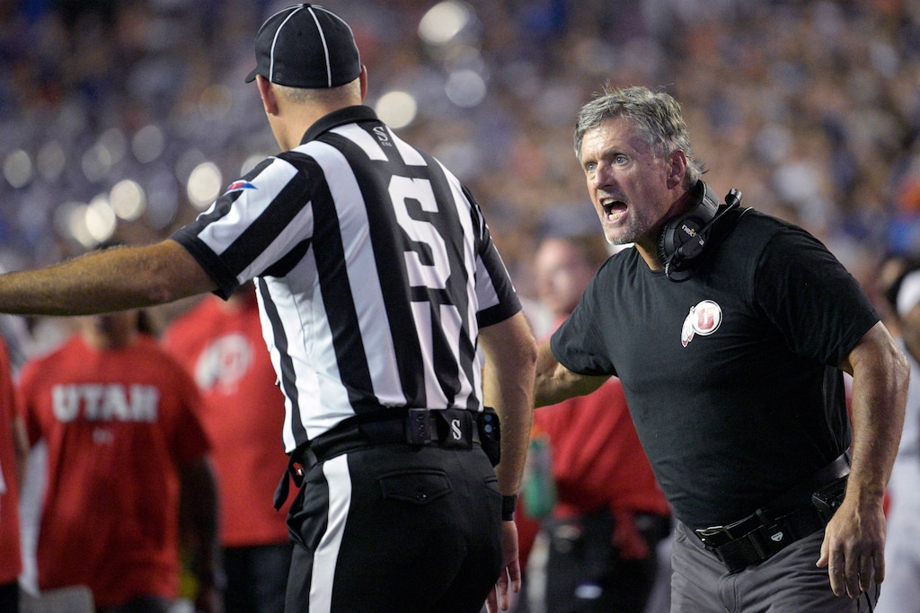 (Phelan M. Ebenhack | AP) Utah coach Kyle Whittingham, right, argues with an official during the second half of the team's NCAA college football game against Florida, Saturday, Sept. 3, 2022, in Gainesville, Fla.