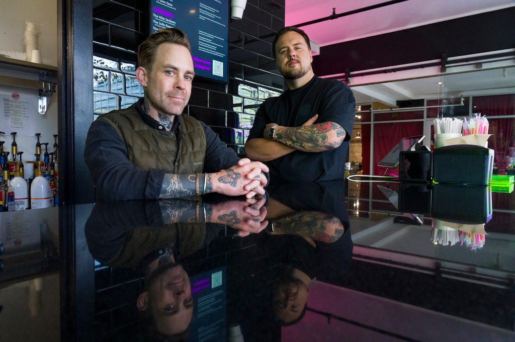 (Bethany Baker  |  The Salt Lake Tribune) Fletch Howell, right, and James Morris stand behind the counter of their new soda shop Sizzurp Soda Lab in Salt Lake City on Monday, Nov. 17, 2025.