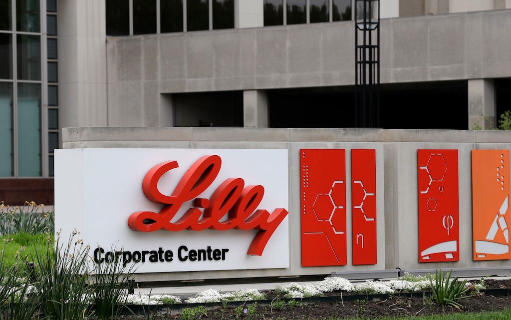 FILE - This April 26, 2017, file photo shows the Eli Lilly & Co. corporate headquarters in Indianapolis. Eli Lilly is planning an initial public offering for part of an animal health business that brought in about 13 percent of total revenue last year. The drugmaker said Tuesday, July 24, 2018, that the IPO will represent an ownership stake of less than 20 percent, and it will divest its remaining ownership stake in Elanco Animal Health. (AP Photo/Darron Cummings, File)
