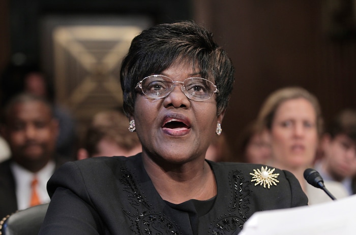 FILE - In this June 29, 2011, file photo, Betty Dukes testifies on Capitol Hill in Washington, during a Senate Judiciary Committee hearing to examine the factors at issue in the recent Dukes v. Wal-Mart Stores Supreme Court ruling. The Walmart greeter who took the retail giant all the way to the U.S. Supreme court in the largest gender bias class-action lawsuit in U.S. history has died. Betty Dukes died July 10, 2017 at her home in Antioch, Calif., said her niece Rita Roland. She was 67. (AP Photo/J. Scott Applewhite, File)
