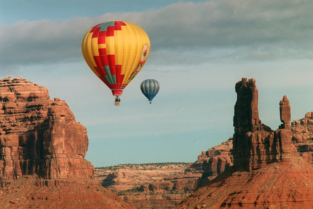 (Al Hartmann  |  The Salt Lake Tribune)  Hot air balloons hover over formation in Valley of the Gods an area between Bluff and Mexican Hat.  The area was part of Bears Ears National Monument.