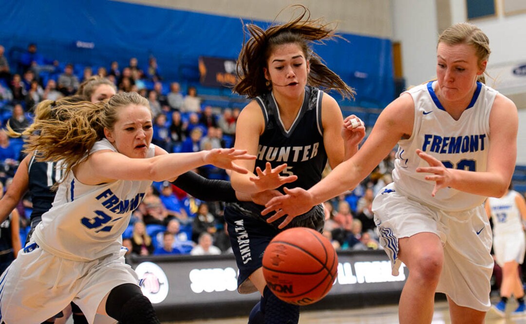 (Trent Nelson | The Salt Lake Tribune)  Fremont's Haylee Doxey (32), Hunter's Tanzie Gasu (5), and Fremont's Berkley Larsen (30) as Hunter faces Fremont in the 6A High School Girls' Basketball Tournament at SLCC in Taylorsville, Tuesday Feb. 20, 2018.