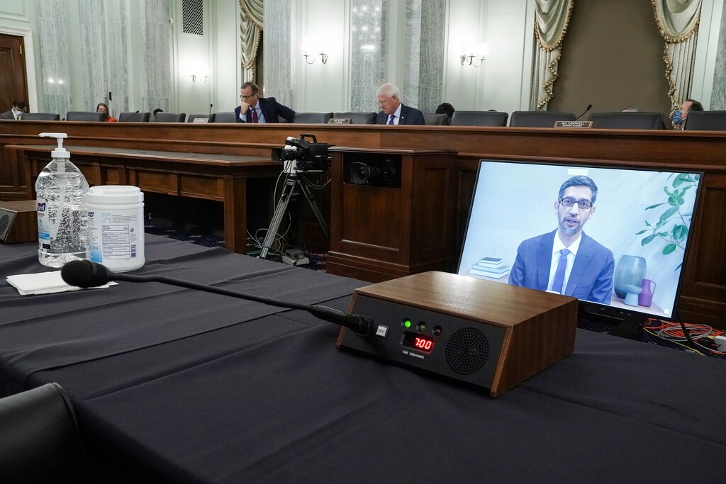 (Greg Nash | Pool via AP)  Google’s CEO Sundar Pichais appears on a screen as he speaks remotely during a hearing before the Senate Commerce Committee on Capitol Hill, Wednesday, Oct. 28, 2020, in Washington. The committee summoned the CEOs of Twitter, Facebook and Google to testify during the hearing.