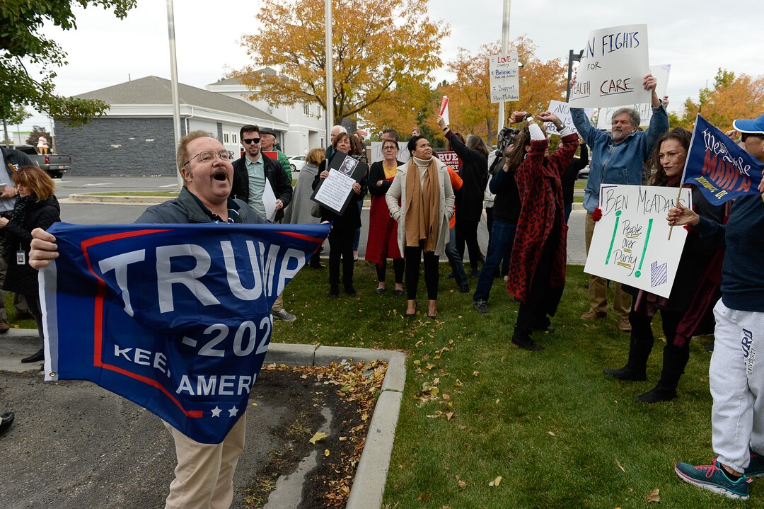 (Francisco Kjolseth  |  The Salt Lake Tribune)  Kevin Howard argues with supporters of the impeachment inquiry as two competing rallies spar near Ben McAdams' office in West Jordan, one seeking to support McAdams and one to criticize him for supporting the impeachment inquiry of President Donald Trump on Wed. Oct. 9, 2019.
