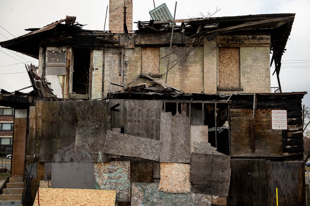 (Trent Nelson | The Salt Lake Tribune)  A dilapidated, fire-damaged building near 100 South 700 East in Salt Lake City, Thursday Feb. 15, 2018. Other Side Academy has received approval to demolish it for their expansion.