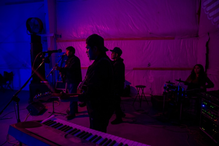 (Adriana Zehbrauskas | The New York Times) JT Band performs at the Bad Country Music Festival, in Shiprock, N.M., Nov. 9, 2019. At highway honky-tonks, casino lounges and far-flung dance halls, a form of music that many associate with rural white America is flourishing in the heart of Indian country, and no tribe have put their own stamp on country music quite like the Navajo.