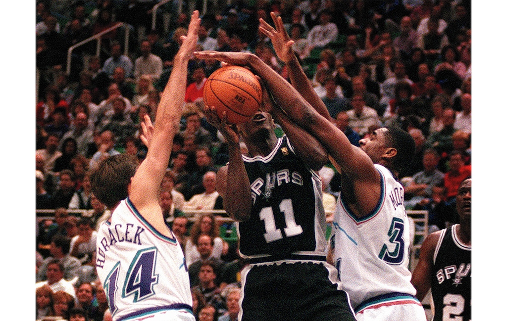 (Ryan M. Galbraith | The Salt Lake Tribune) Jeff Hornacek and Chris Morris give Vernon Maxwell of the Spurs what-for during an NBA game in 1997.