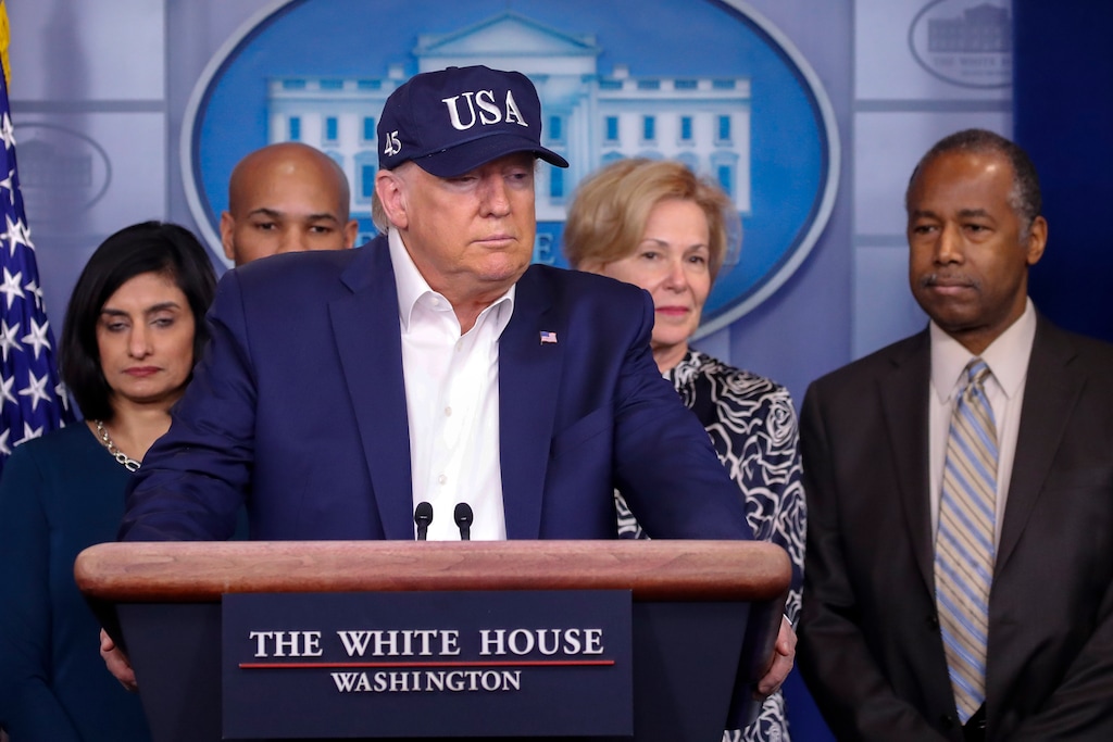(Alex Brandon | AP)  President Donald Trump speaks during a briefing on coronavirus in the Brady press briefing room at the White House, Saturday, March 14, 2020, in Washington. Listening from left are Administrator of the Centers for Medicare and Medicaid Services Seema Verma, U.S. Surgeon General Jerome Adams, Dr. Deborah Birx, White House coronavirus response coordinator, and Housing and Urban Development Secretary Ben Carson.