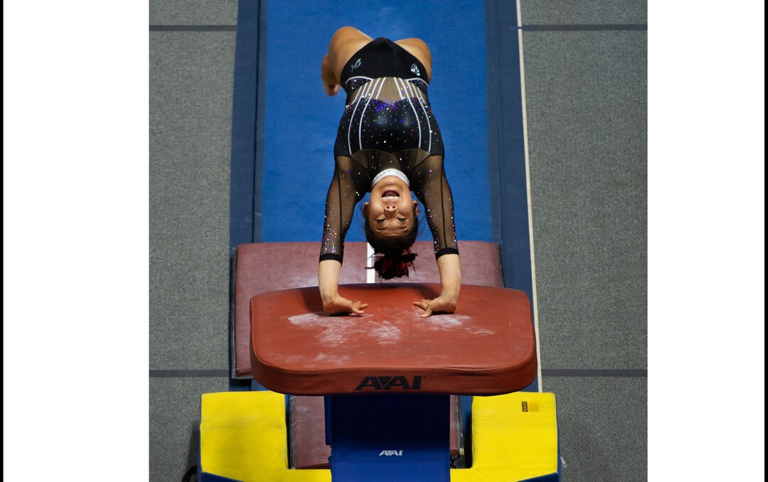 (Francisco Kjolseth  | The Salt Lake Tribune) Cristal Isa launches off the vault in PAC-12 gymnastics action Utah vs UCLA, at the Huntsman Center on Friday, Feb. 19, 2021.