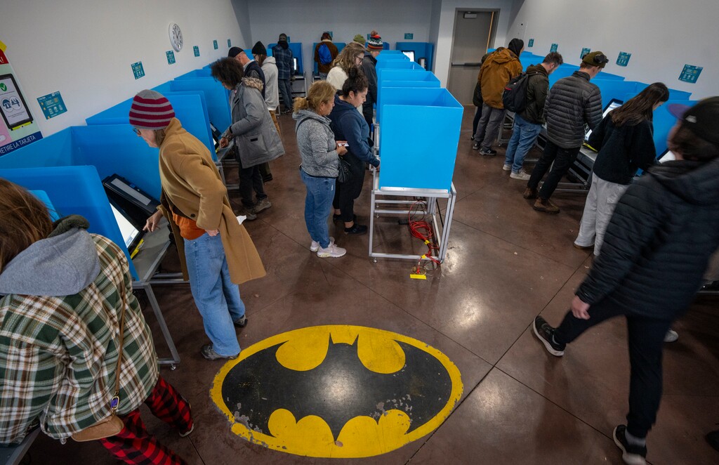 (Rick Egan | The Salt Lake Tribune) Voters cast their ballots at the Salt Lake City Public Library on Tuesday, Nov. 5, 2024.