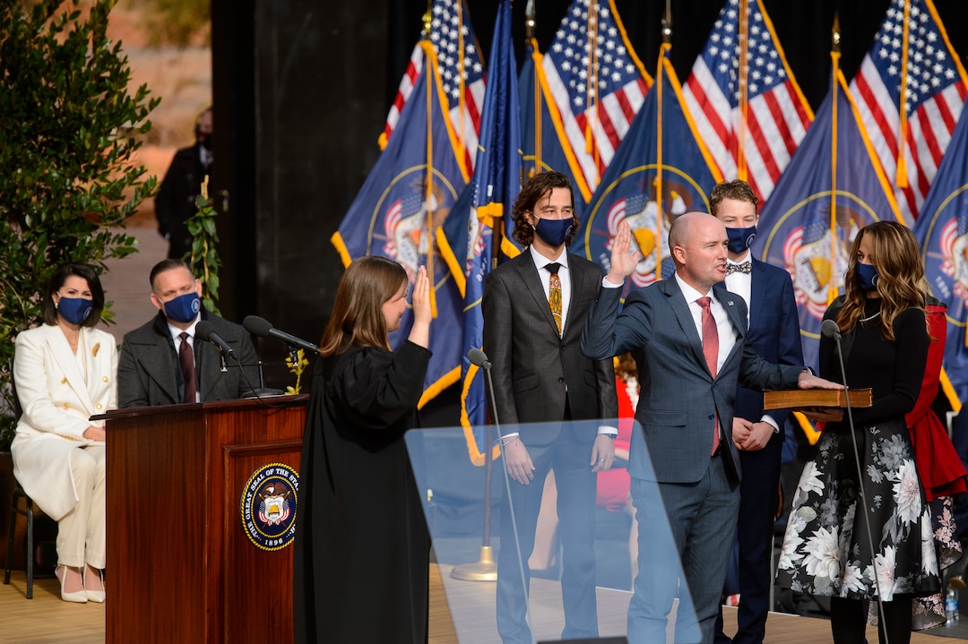 (Trent Nelson  |  The Salt Lake Tribune) Spencer Cox is sworn in as Utah's 18th governor by Utah Supreme Court Justice Paige Peterson at Tuacahn Center for the Arts in Ivins on Monday, Jan. 4, 2021. At right is Abby Cox.