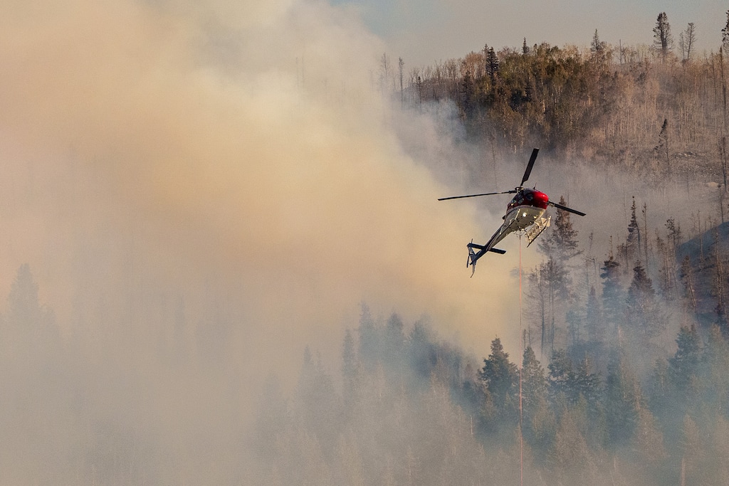 (Trent Nelson | The Salt Lake Tribune) Crews fight the Parleys Canyon Fire on Saturday, Aug. 14, 2021. Tuesday night rain helped firefighters battle the blaze — many of them are expected to be released on Wednesday.