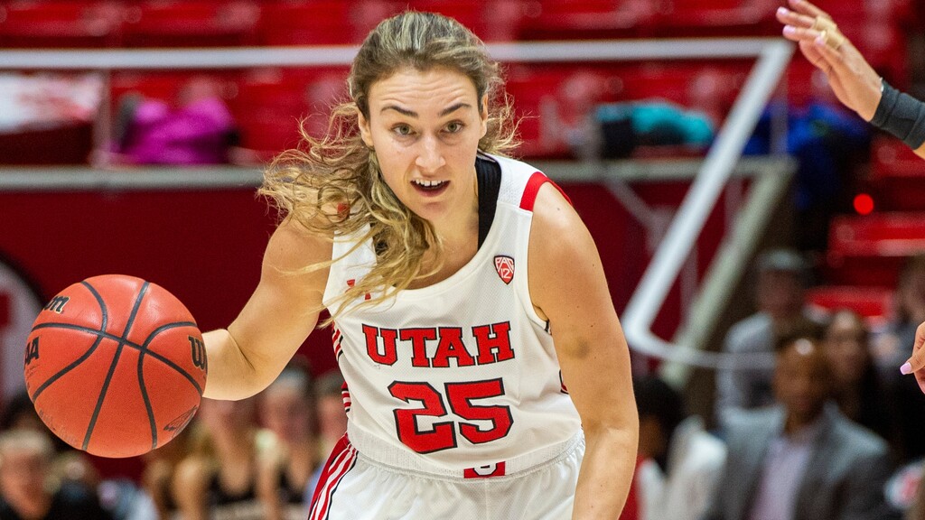 (Rick Egan | The Salt Lake Tribune) Utah Utes guard Julie Brosseau (25) takes the ball down the court as Colorado Buffaloes guard Quinessa Caylao-Do (0) defends in Pac-12 basketball action at the Jon M. Huntsman Center, Sunday, Dec. 29, 2019.