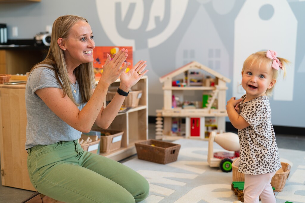 (Podium) Bryce Hunt plays with her daughter, June, at Little Founders, an on-site child care center at Podium in Lehi that opened in July. Hunt, a Podium employee, said she was excited to have a place for her child to go while she is at work.