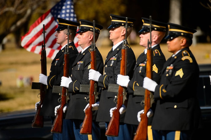 (Trent Nelson | The Salt Lake Tribune)  An honor guard at the graveside service for Jon Huntsman Sr. at Wasatch Lawn Memorial Park & Mortuary in Salt Lake City, Saturday February 10, 2018.