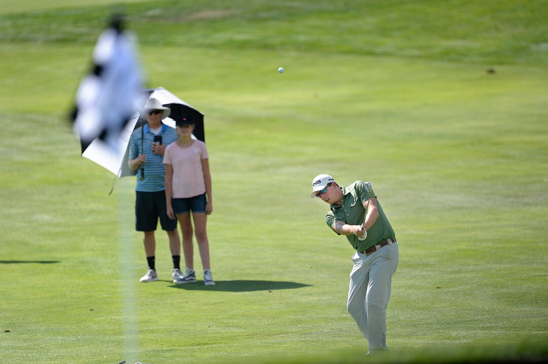 (Scott Sommerdorf   |  The Salt Lake Tribune)   Second place finisher Zahkai Brown chis onto the 18th green to finish 17-under, nine shots behind the winner, Patrick Fishburn. Fishburn won the Utah Open golf tournament played at the Riverside Country Club, Sunday, August 27, 2017. 