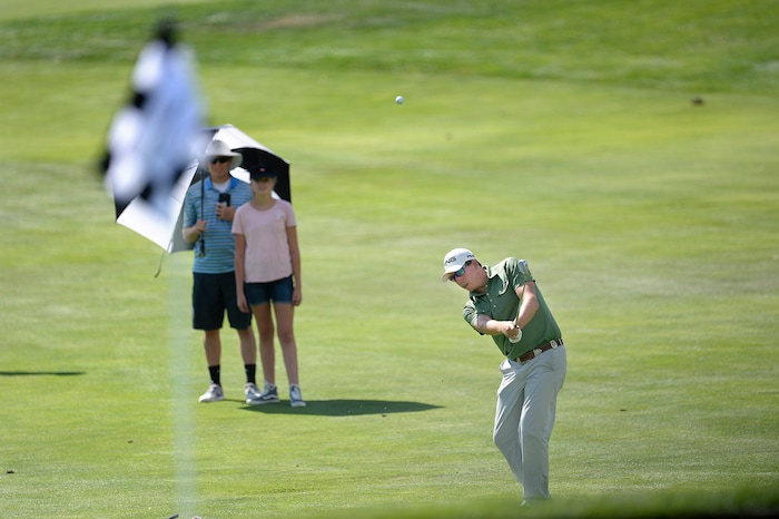 (Scott Sommerdorf | The Salt Lake Tribune)
Second place finisher Zahkai Brown chis onto the 18th green to finish 17-under, nine shots behind the winner, Patrick Fishburn. Fishburn won the Utah Open golf tournament played at the Riverside Country Club, Sunday, August 27, 2017.