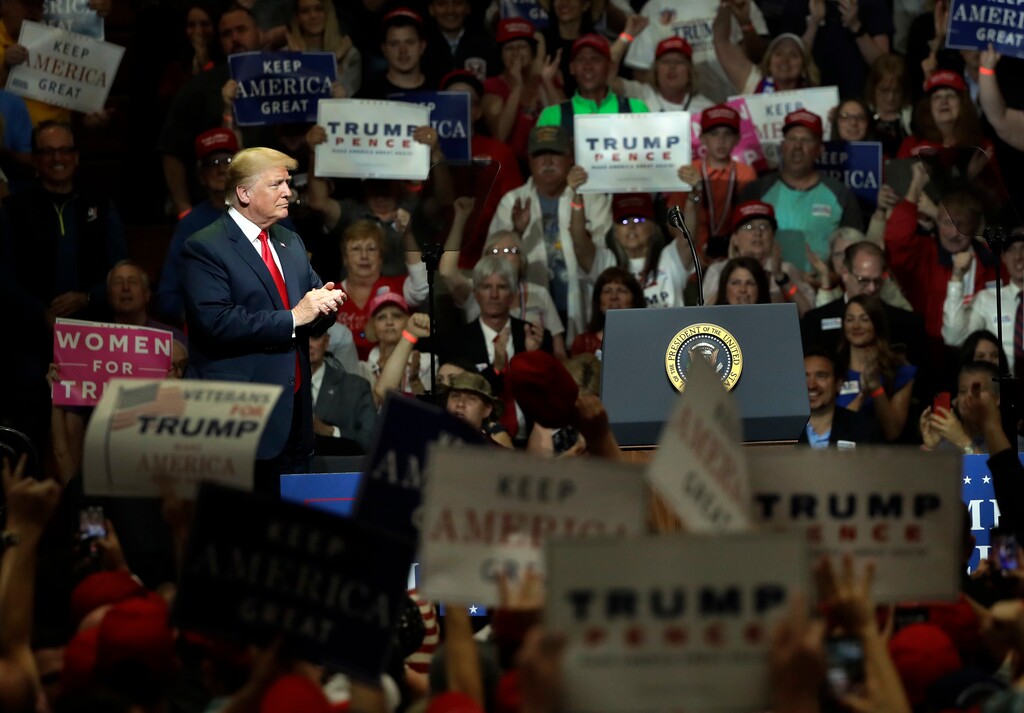 President Donald Trump acknowledges the crowd's applause during a Republican campaign rally Thursday, May 10, 2018, in Elkhart, Ind. (AP Photo/Charles Rex Arbogast)