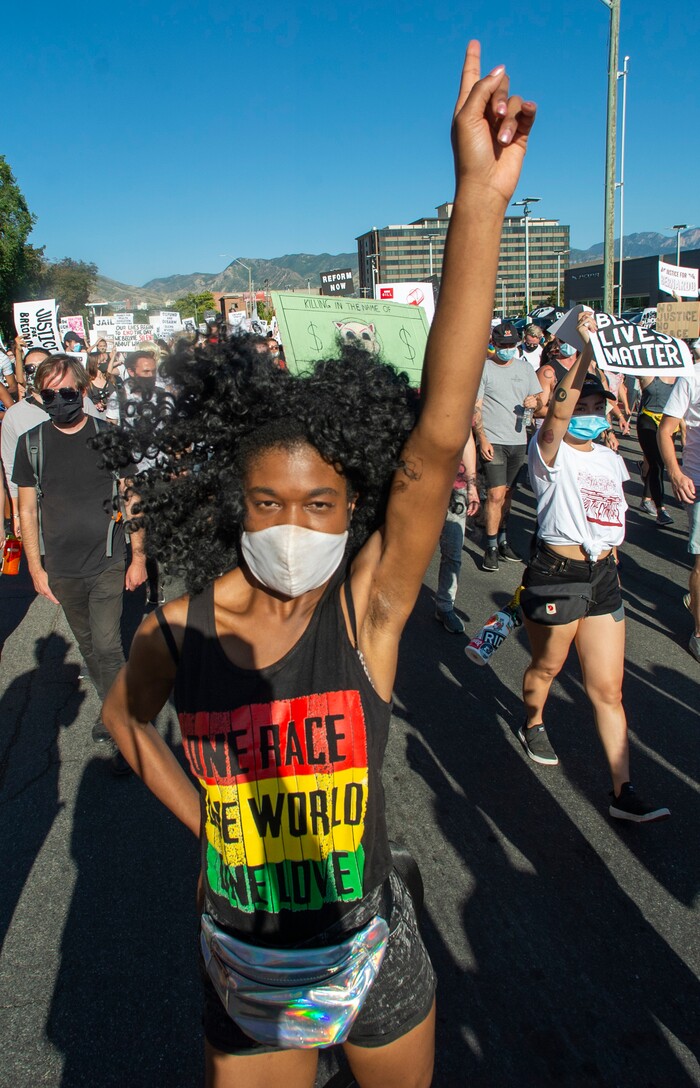 (Rick Egan  |  The Salt Lake Tribune)     Kayla McKay dances in the streets of Salt Lake City, during the Dance Dance Revolution protest for racial equality, on Sunday, Aug. 9, 2020.