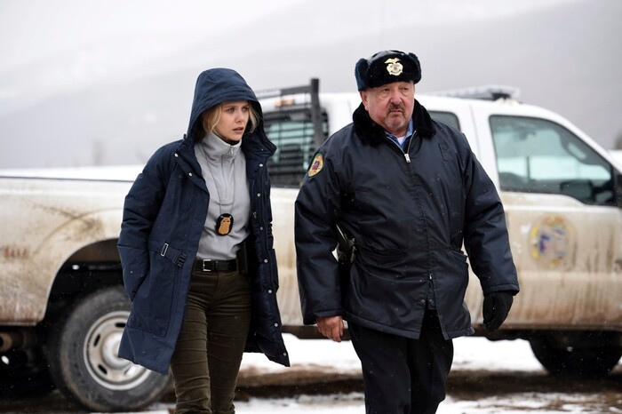 This image released by The Weinstein Company shows Elizabeth Olsen, left, and Graham Greene in a scene from "Wind River." (Fred Hayes/The Weinstein Company via AP)