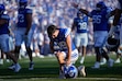 (Francisco Kjolseth | The Salt Lake Tribune) BYU players bow their heads before the start of their game against Utah Tech, Saturday, Sept. 5, 2026, at LaVell Edwards Stadium in Provo.