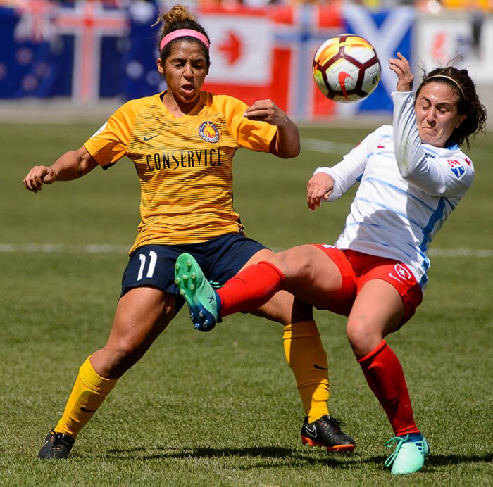 (Trent Nelson | The Salt Lake Tribune)  
Utah Royals FC hosts the Chicago Red Stars, at Rio Tinto Stadium in Sandy, Saturday April 14, 2018. Utah Royals FC midfielder Desiree Scott (11) and Chicago Red Stars midfielder Danielle Colaprico (24).