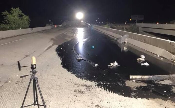 (Photo courtesy Carbon County Sheriff's Department) A truck accident resulted in an 8,000-gallon crude oil leak on Highway 6 in Carbon County.