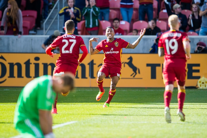 (Chris Detrick  |  The Salt Lake Tribune)  Real Salt Lake forward Brooks Lennon (27) celebrates with Real Salt Lake forward Joao Plata (10) after scoring a goal past Sporting Kansas City goalkeeper Andrew Dykstra (21) during the game at Rio Tinto Stadium Sunday, October 22, 2017.  