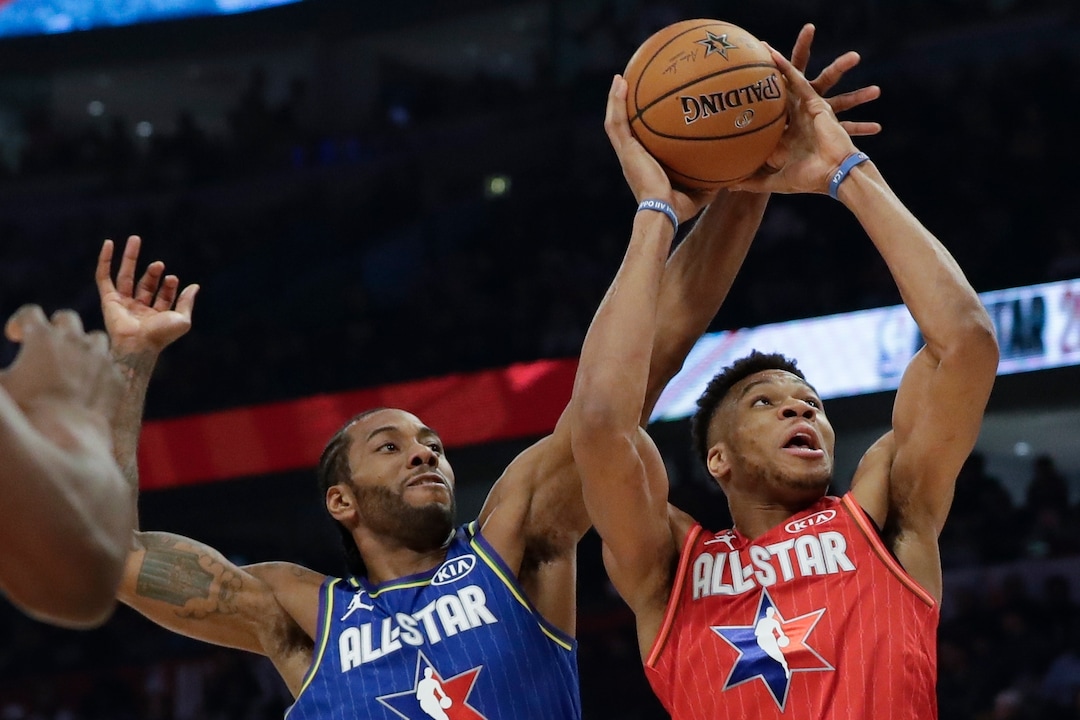 Kawhi Leonard of the Los Angeles Clippers blocks a shot of Giannis Antetokounmpo of the Milwaukee Bucks during the second half of the NBA All-Star basketball game Sunday, Feb. 16, 2020, in Chicago. (AP Photo/Nam Huh)