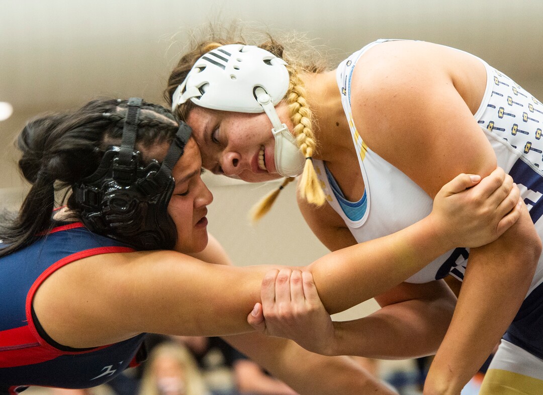 (Rick Egan | The Salt Lake Tribune)  Lizzie Shunn (Westlake) wrestles Hotaia Valeti (Springville) in the girls 140 division, at the High School All Star wrestling event in Orem, on Tuesday, Jan. 12, 2021.