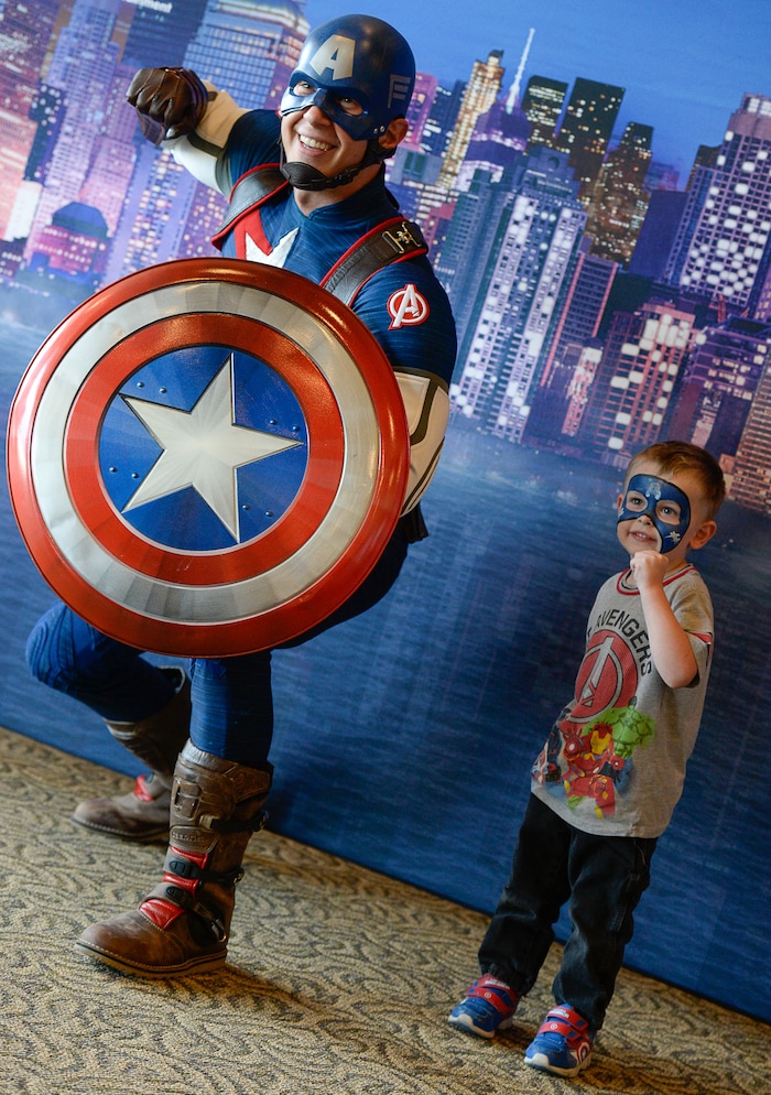 (Francisco Kjolseth  |  The Salt Lake Tribune)  Corbin Gleave, 6, poses for a photo with Captain America as Utah-based military families gather for the Salt Lake opening night of the all-new Marvel Universe LIVE! Age of Heroes, witnessing their favorite Marvel super heroes, including The Avengers, Spider-Man and the Guardians of the Galaxy in an action-packed adventure at the Maverik Center on Thursday, Sept. 28, 2017. MarvelÕs greatest military Super Hero Captain America was partnered with Got Your 6, a military veteran non-profit group dedicated to empowering veterans to lead and build stronger communities across America.