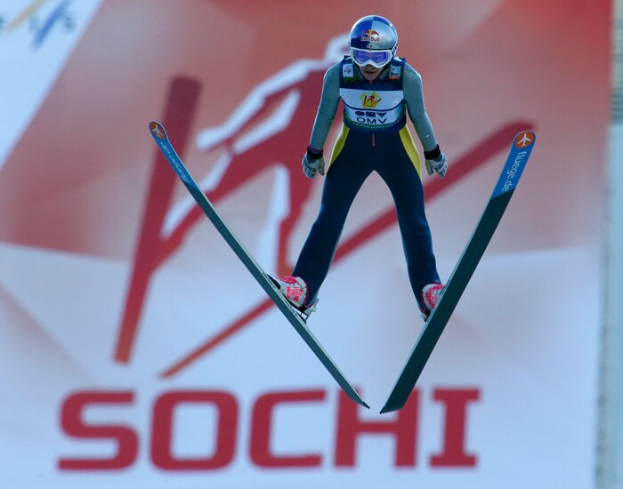 Sarah Hendrickson of the US, makes her competition jump during the Women's Normal Hill Individual event at the  FIS Ski jumping Cup in Sochi, Russia, Sunday, Dec. 9, 2012. (AP Photo/Dmitry Lovetsky)