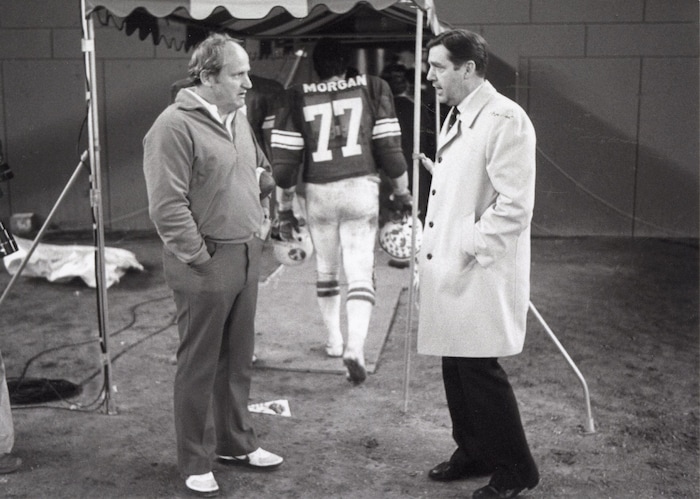 (The Church of Jesus Christ of Latter-day Saints) Jeffrey R. Holland, right, then president of Brigham Young University, speaks with BYU football coach LaVell Edwards in an undated photograph.