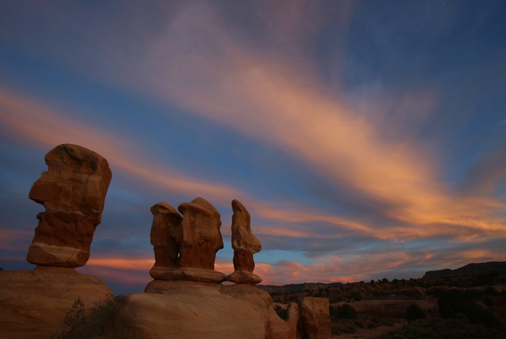 (Francisco Kjolseth  |  Tribune file photo) Sky over the hoodoos of Devil's Garden in the former Grand Staircase-Escalante National Monument. New polling finds widespread disapproval among Western voters of the Trump administration’s public land policies, including recent reductions to Grand Staircase and the Bears Ears National national monuments.