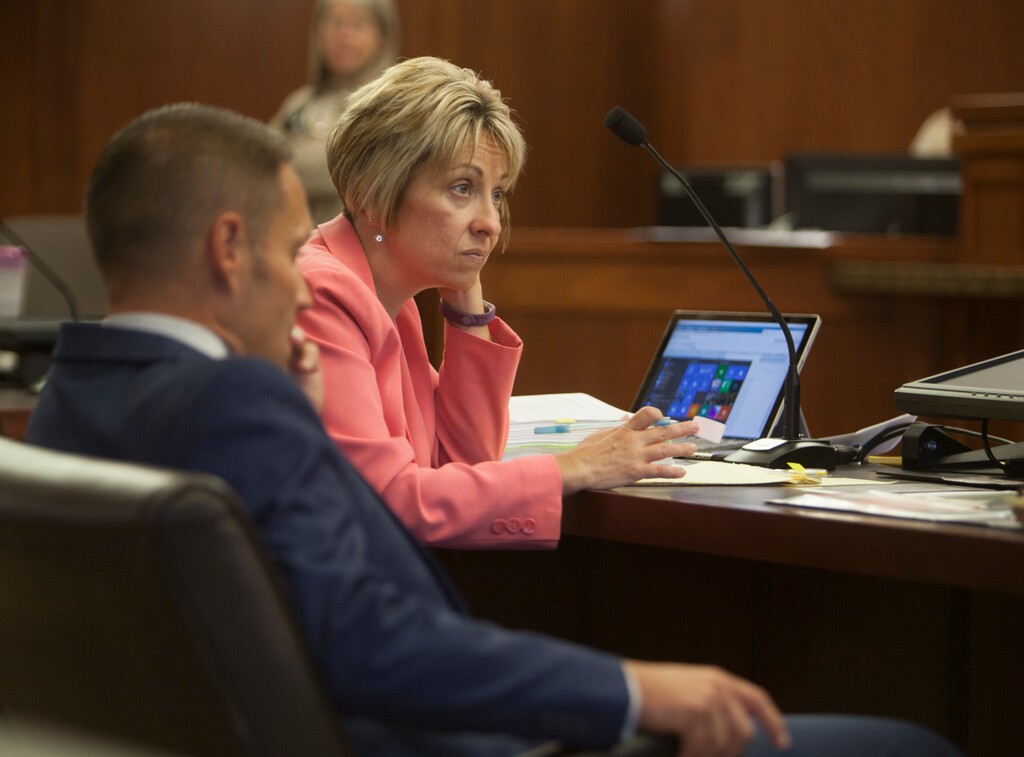 (Chris Caldwell/The Spectrum via AP) In this Monday, June 18, 2018, photo, Deputy County Attorney Angela Adams questions witnesses in St. George during a preliminary hearing for a 16-year-old boy accused of bringing a incendiary device to Pine View High School. The Utah teenager told police that he tried to blow up a homemade device in his backpack at school because he'd been looking at Islamic State propaganda and wanted to cause fear, according to a video of the conversation shown in court Monday.