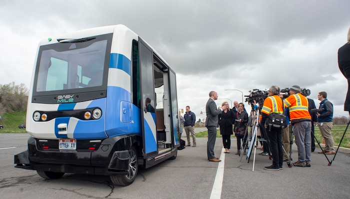 (Rick Egan  |  The Salt Lake Tribune)   Lt. Governor Spencer J. Cox talks to the media after his ride in the Autonomous Shuttle, at the test track is across the street from UDOT headquarters on the west side of 2700 West. Thursday, April 11, 2019.


