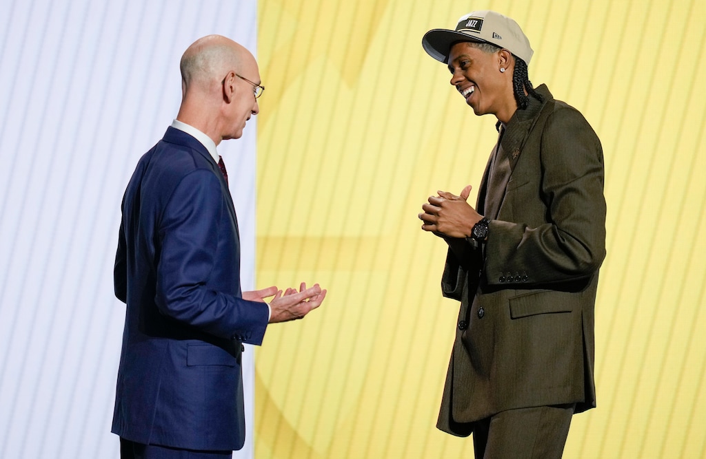 (Julia Nikhinson | AP) Cody Williams, right, greets NBA commissioner Adam Silver after being selected by the Utah Jazz as the 10th pick during the first round of the NBA basketball draft, Wednesday, June 26, 2024, in New York.
