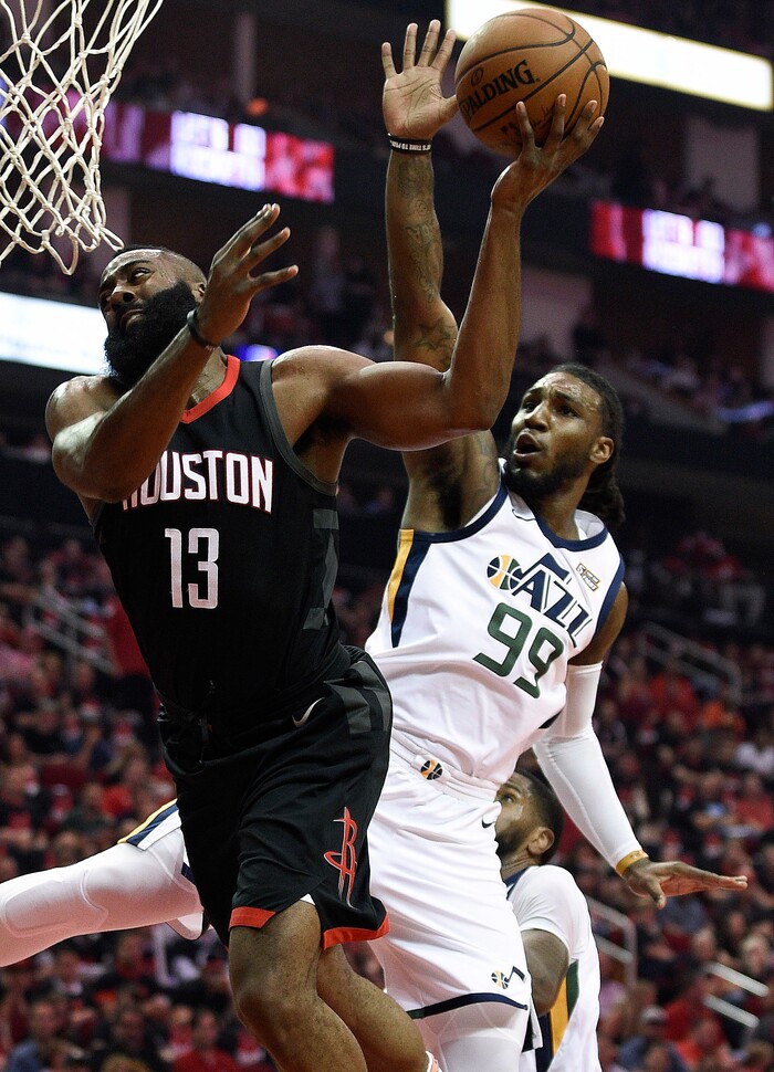 Houston Rockets guard James Harden (13) is fouled by Utah Jazz forward Jae Crowder (99) during the first half in Game 5 of an NBA basketball second-round playoff series, Tuesday, May 8, 2018, in Houston. (AP Photo/Eric Christian Smith)