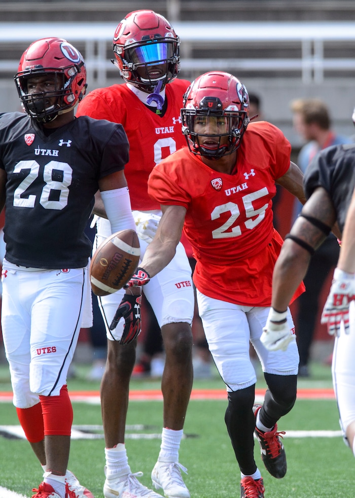 (Steve Griffin  |  The Salt Lake Tribune) Utah wide receiver Jaylen Dixon tosses the ball to the ref after making a nice catch over the middle during the University of Utah football team's first scrimmage at Rice-Eccles Stadium in Salt Lake City Friday March 30, 2018.