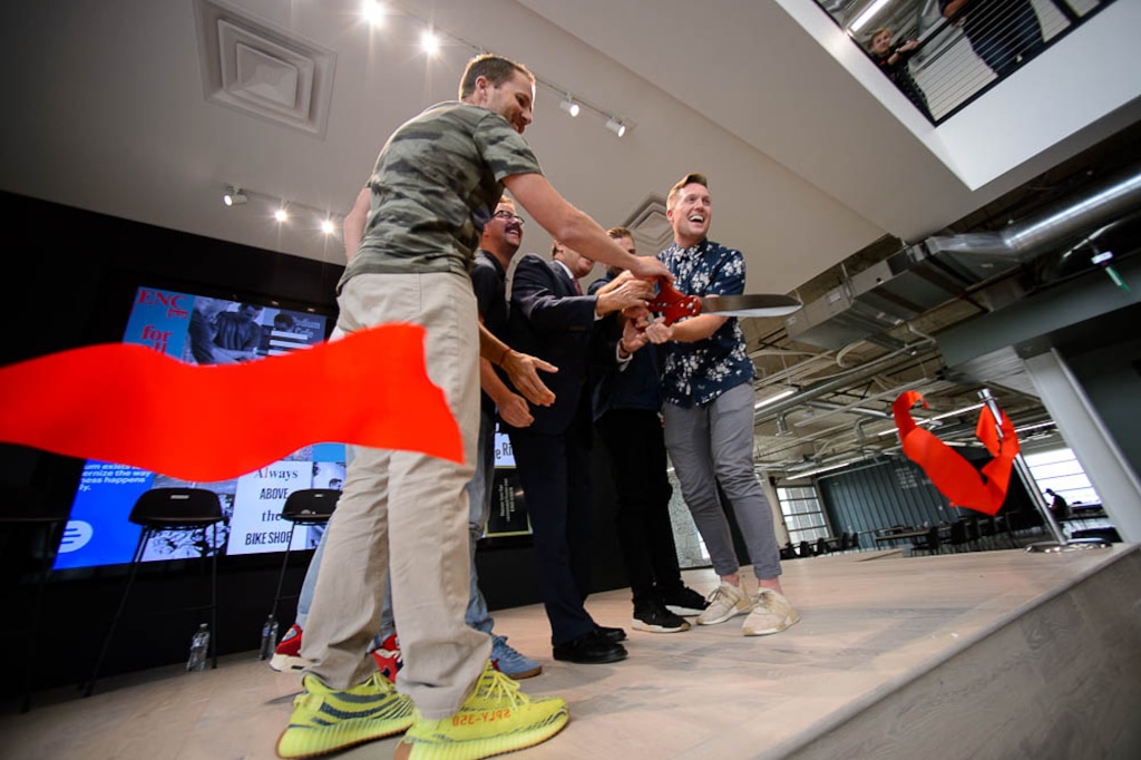 (Trent Nelson | The Salt Lake Tribune)
The ribbon cutting ceremony for Podium's new Lehi headquarters, Wednesday Aug. 15, 2018. Podium helps small businesses manage their web presence. Left to right, Adam Edmunds (president, Podium), Sid Krommenhoek (Peak Ventures), Clint Betts (executive director, Silicon Slopes), Utah Gov. Gary Herbert, Dennis Steele (co-founder, Podium), and Eric Rea (co-founder and CEO, Podium).