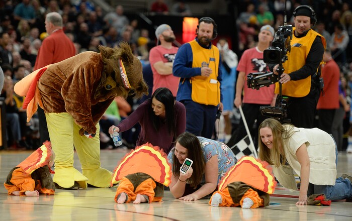 (Francisco Kjolseth  |  The Salt Lake Tribune)  The day before Thanksgiving brings out some silly turkey race games with infants during a time out as the Utah Jazz take on the Sacramento Kings in the NBA game at Vivint Smart Home Arena Wed., Nov. 21, 2018, in Salt Lake City.