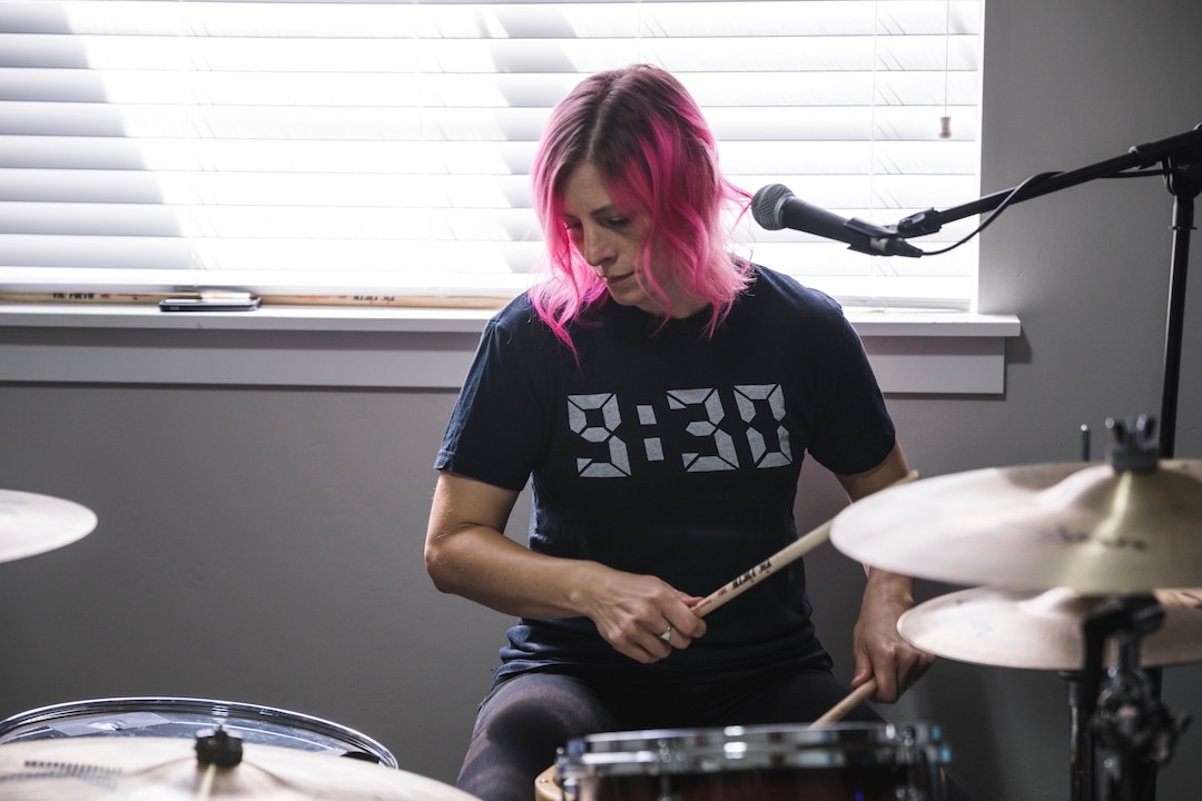 (Clark Clifford  |  For The Salt Lake Tribune) Elaine Bradley of Noble Bodies drumming during a practice for an upcoming show in the band's rehearsal space in Orem on Saturday, Aug. 3, 2019.