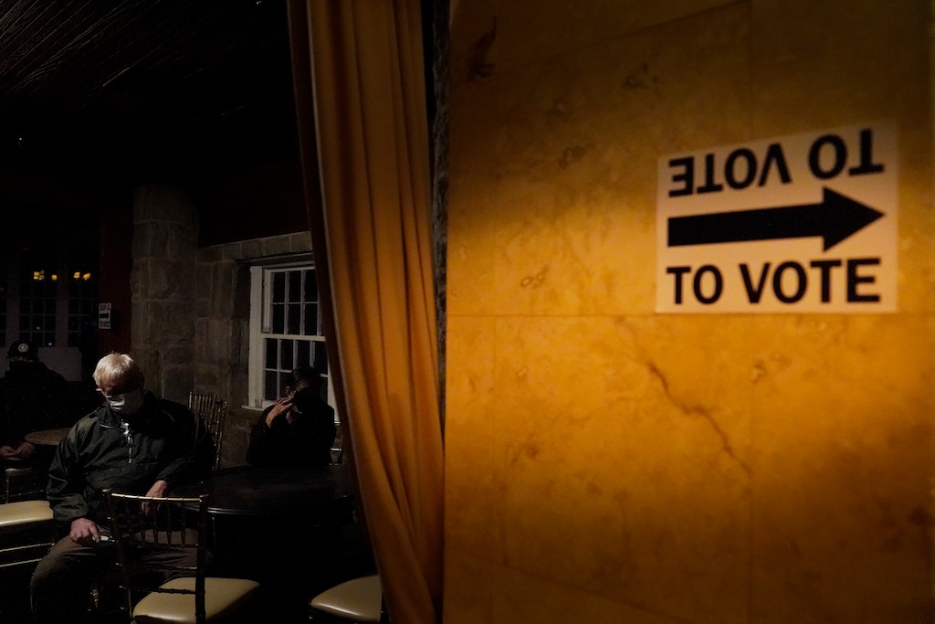 (Brynn Anderson | AP file photo)

In this Jan. 5 photo, voters wait in line to cast their ballots in Georgia's Senate runoff election in Atlanta.
