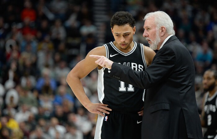 (Francisco Kjolseth  |  The Salt Lake Tribune)  San Antonio Spurs guard Bryn Forbes (11) speaks with coach Gregg Popovich during the first half of the NBA basketball game against the Jazz in Salt Lake City, Thursday, Dec. 21, 2017.