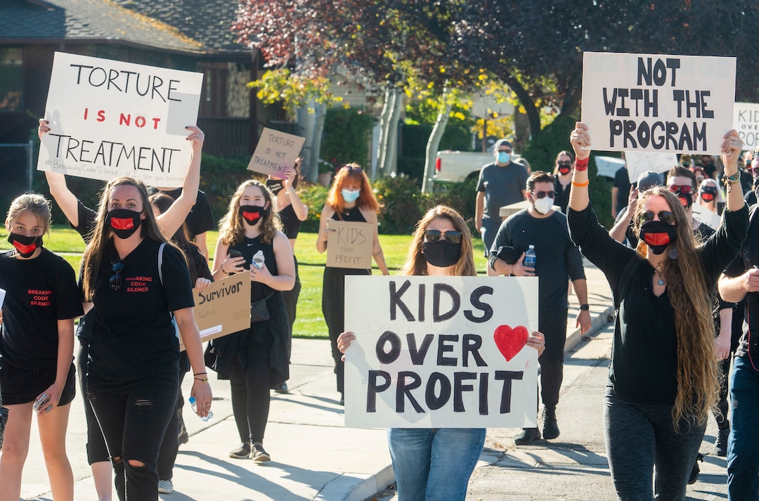 (Rick Egan  |  The Salt Lake Tribune)  Protesters join a march to the Provo Canyon School, during a rally calling for the closure of Provo Canyon School, a residential treatment center in Utah she attended when she was a teen, on Friday, Oct. 9, 2020.