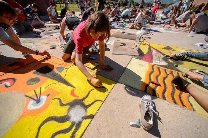 (Trent Nelson | The Salt Lake Tribune)  Alta High School's annual "Chalk the Walk" event, a school tradition since 1985 in which students recreate famous art works in sidewalk chalk. Jae Bailey and Kyra Franco, Friday May 25, 2018.