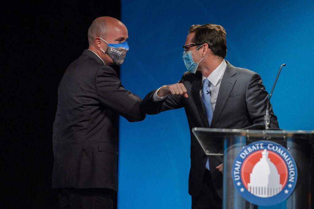 (Trent Nelson | The Salt Lake Tribune) Lt. Gov. Spencer Cox and Chris Peterson, rivals to become Utah's next governor, bump elbows after facing each other in a prime-time debate in Salt Lake City on Tuesday, Sept. 29, 2020.