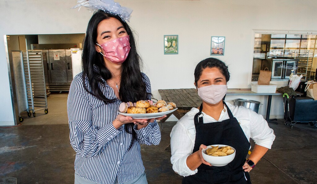 (Rick Egan | The Salt Lake Tribune) Chef Mika Lee of Honey Teahive, left, and Chef Merab Maciel of The Salseria, photographed Feb. 24, both often have their foods featured in Spice Kitchen Incubator's community food boxes.