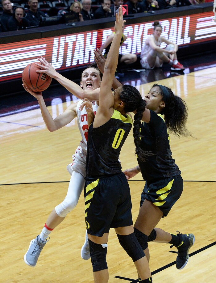 Scott Sommerdorf | The Salt Lake TribuneUtah Utes guard/forward Tilar Clark (24) goes up against Oregon Ducks forward Satou Sabally (0) during first half play. Oregon defeated Utah 84-68, Sunday, January 28, 2018.